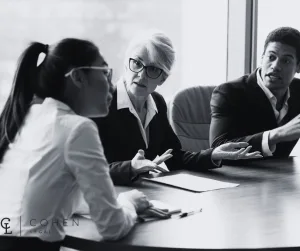 Cohen Legal - Body corporate meeting discussing property damage responsibility