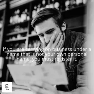 Business Owner Reviewing Business Registration Documents