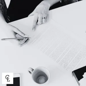 Business Owners In North Queensland Reviewing Partnership Agreement Documents At Tax Time