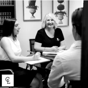 Lawyer At Cohen Legal Townsville, Discussing A Building Dispute With A Client